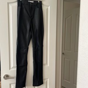 Faux leather pants with slit at ankles